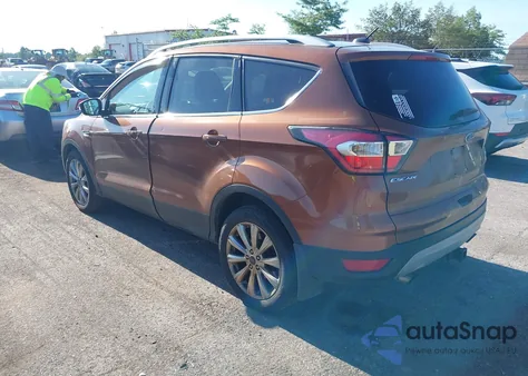 2017 Ford Escape Titanium z USA, uszkodzony, nr VIN 1FMCU9J93HUA31651